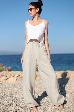 Lněné turecké kalhoty vyrobené z měkčeného lnu. Materiál, ze kterého jsou tyto harémky vyrobeny, je vzdušný a